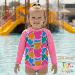 Conjunto UV 50+ Naranjo Niña corazones rosa